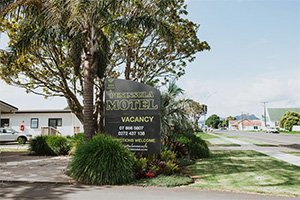 Peninsula Motel Whitianga accommodation sign near town centre Coromandel