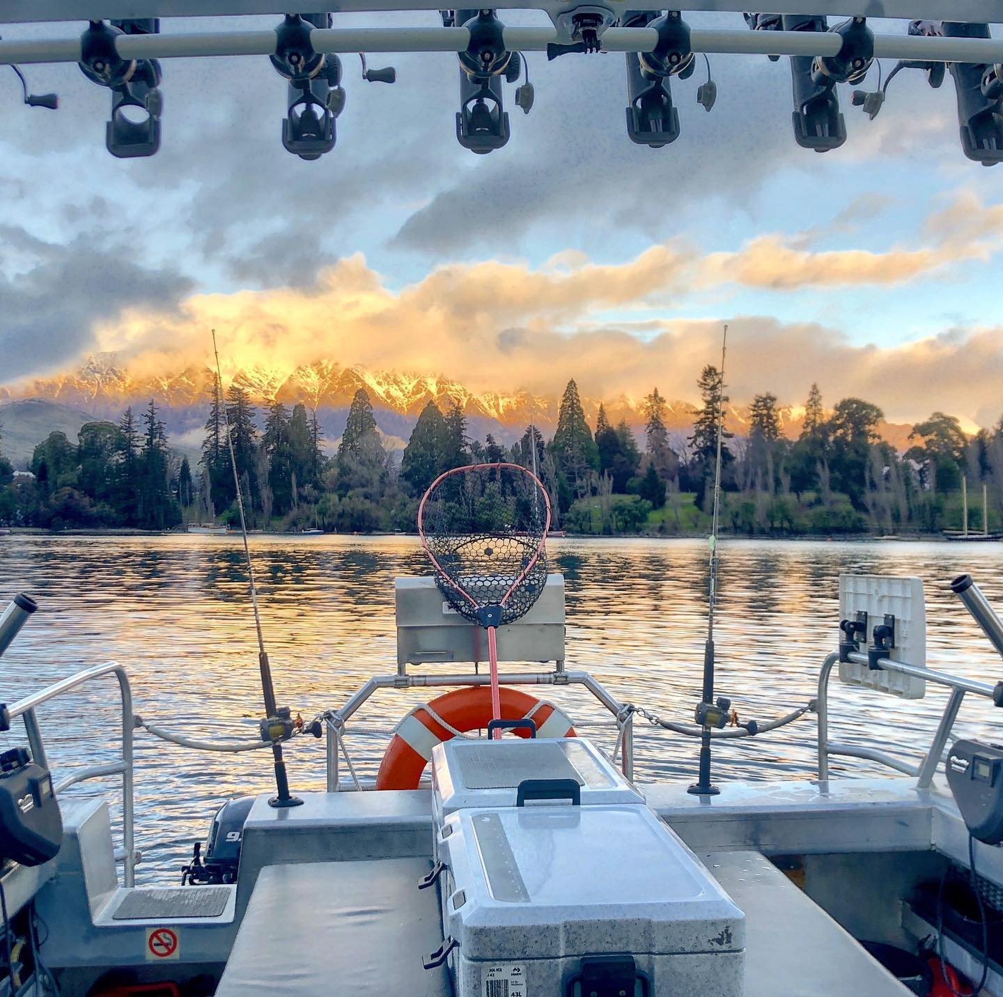 Go fishing on Lake Wakatipu to catch salmon and rainbow trout