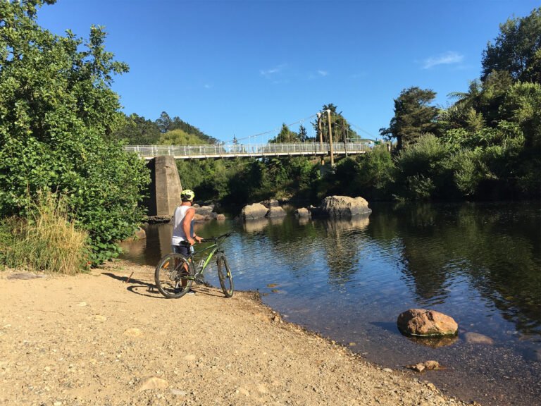 karangahake gorge suspension bridge cyclist 768x576