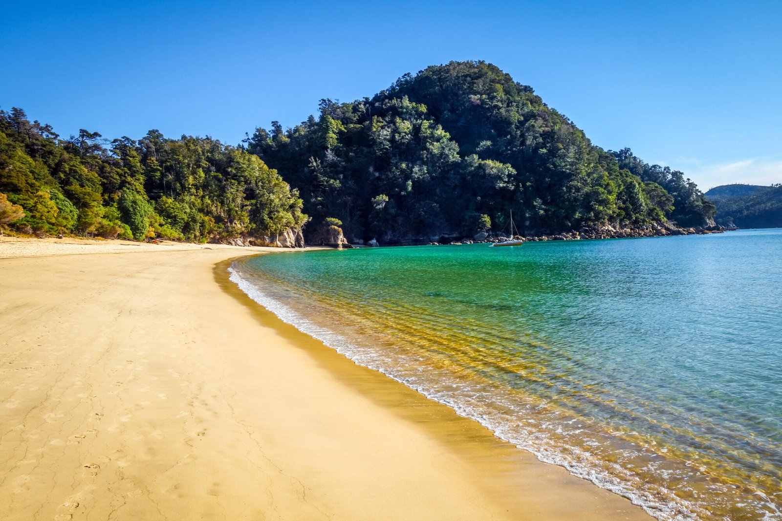 Kaiteriteri Beach with golden sand and clear blue water in Nelson Tasman