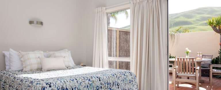 private courtyard ocean beach wainui 1 768x312