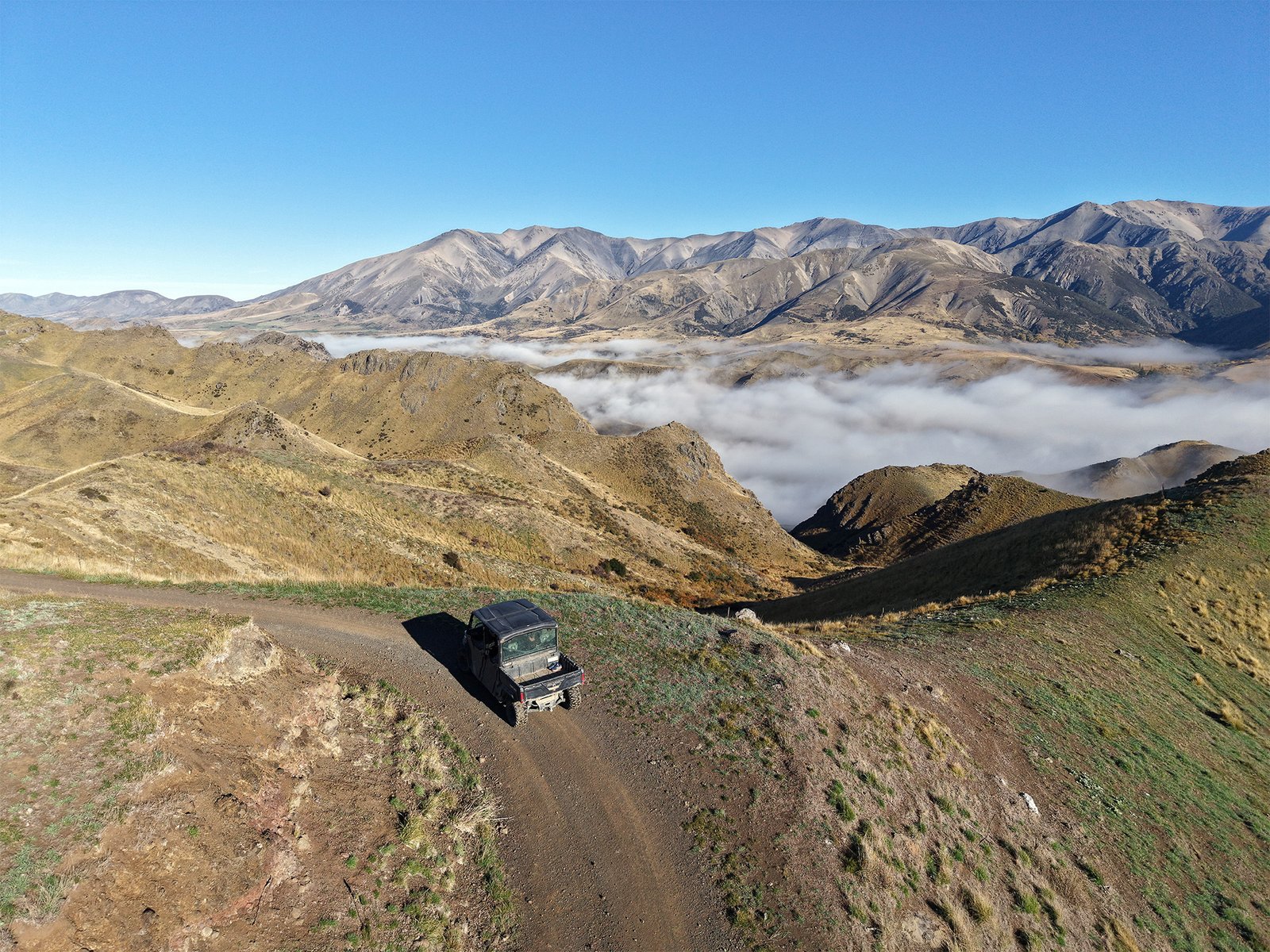 Panoramic view of the Awatere Valley from Middlehurst Station with high-country mountains and morning cloud inversion in Marlborough