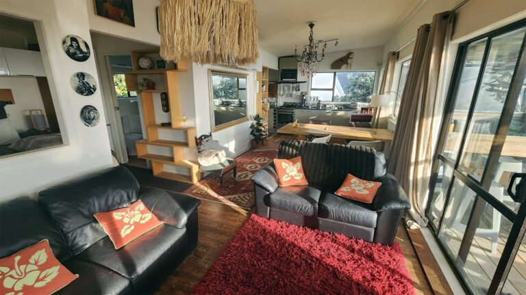 piha sunset bach open plan living 768x432
